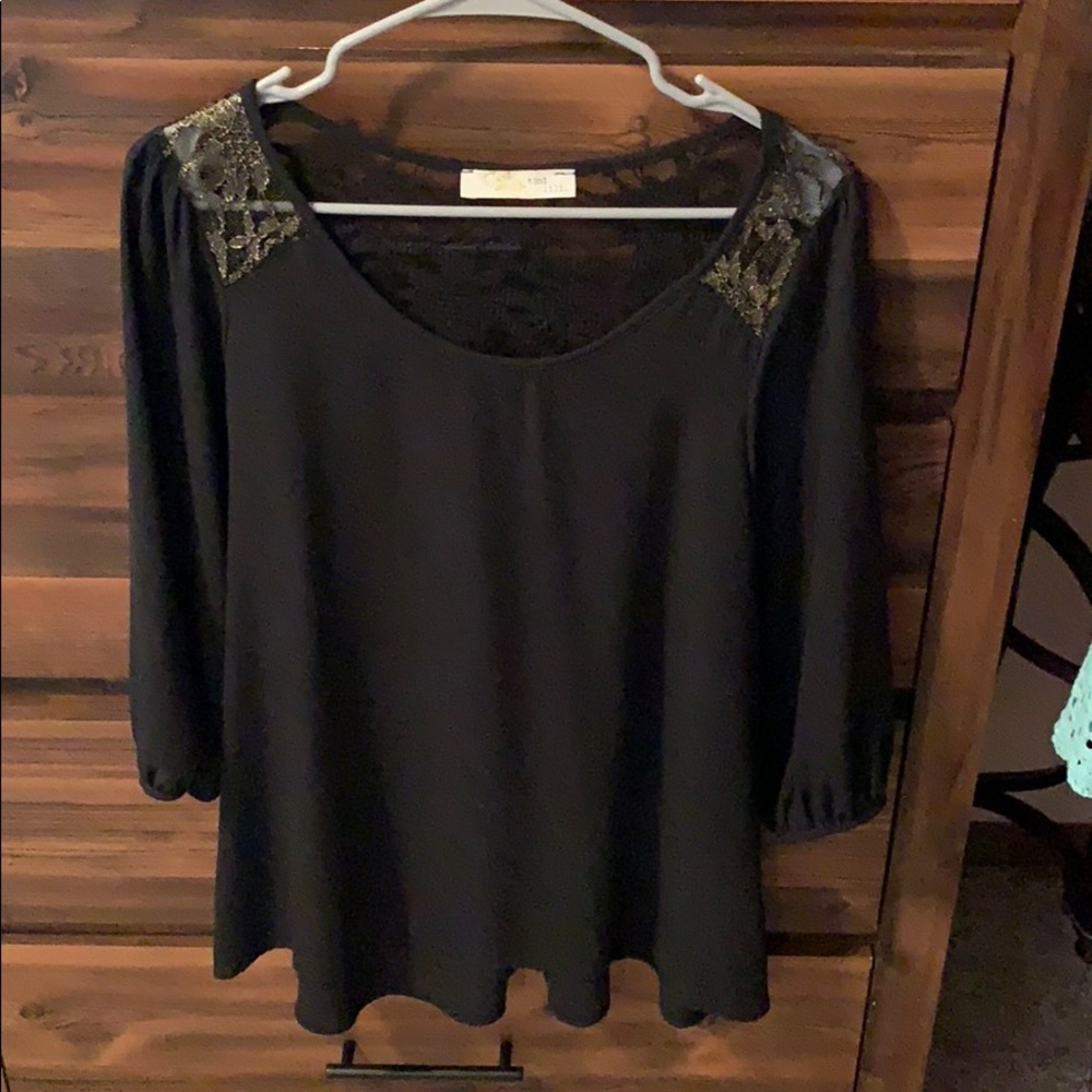 Black 3/4 sleeve top with gold lace detail